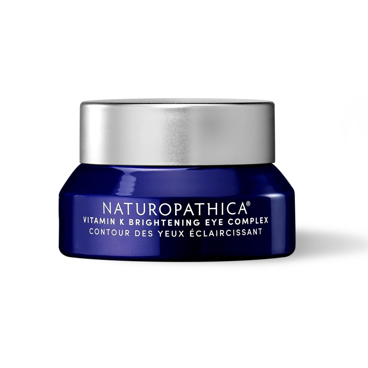 Naturopathica Vitamin K Brightening Eye Complex jar close-up showing premium packaging.