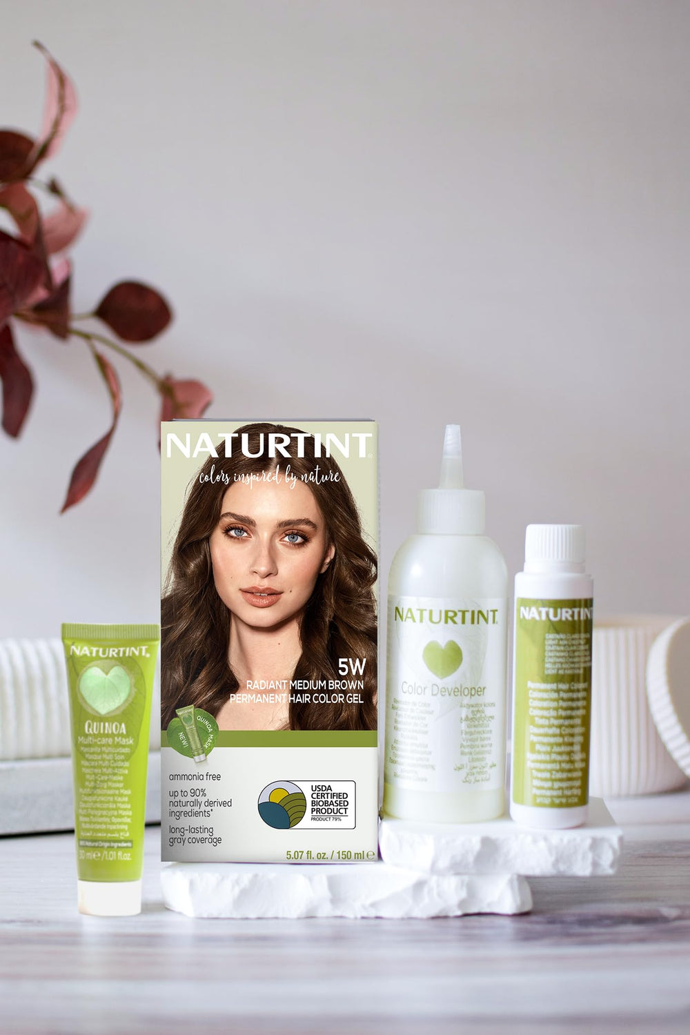 Naturtint plant-based ingredients close-up emphasize conditioning and gentle color.