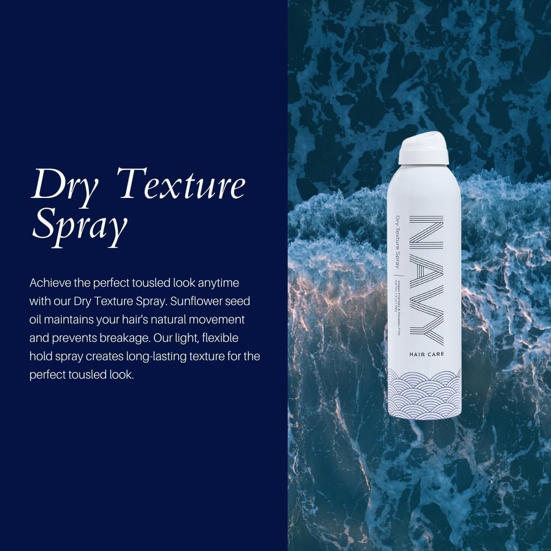 Navy Hair Care Dry Texture Spray misting in air to create texture