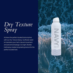 Navy Hair Care Dry Texture Spray misting in air to create texture