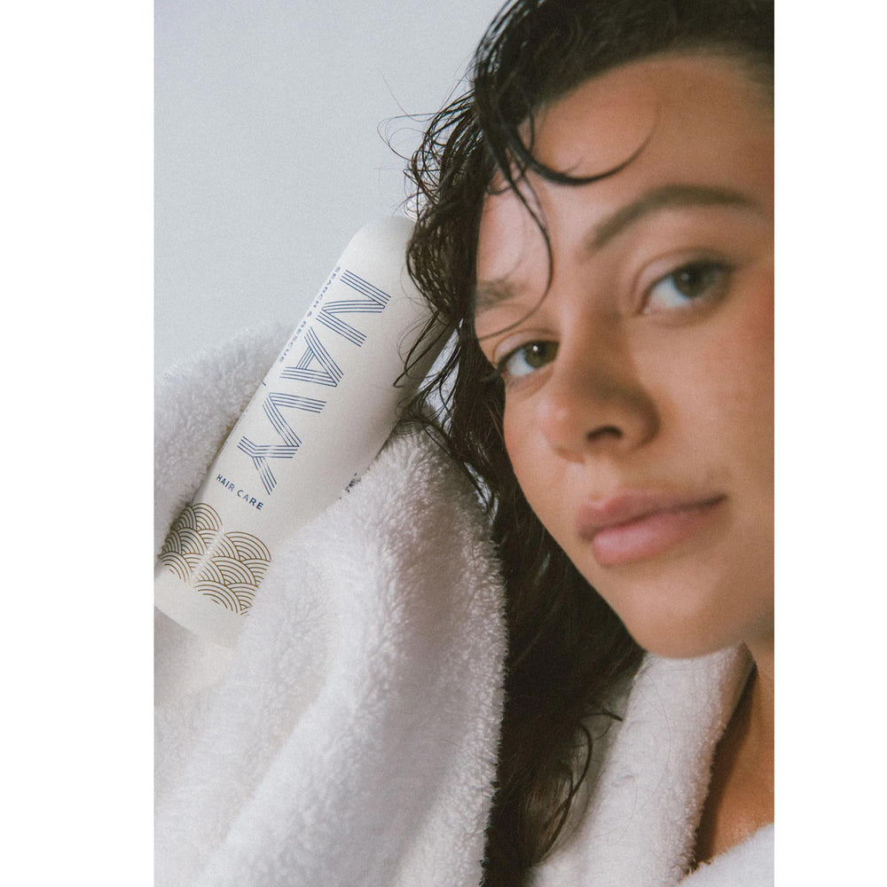 NAVY Hair Care Search and Rescue Conditioner ingredients include biotin and rosemary oil for nourished roots.