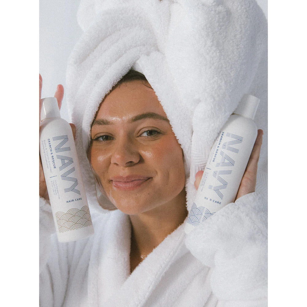 NAVY shampoo being applied to hair for gentle cleansing.