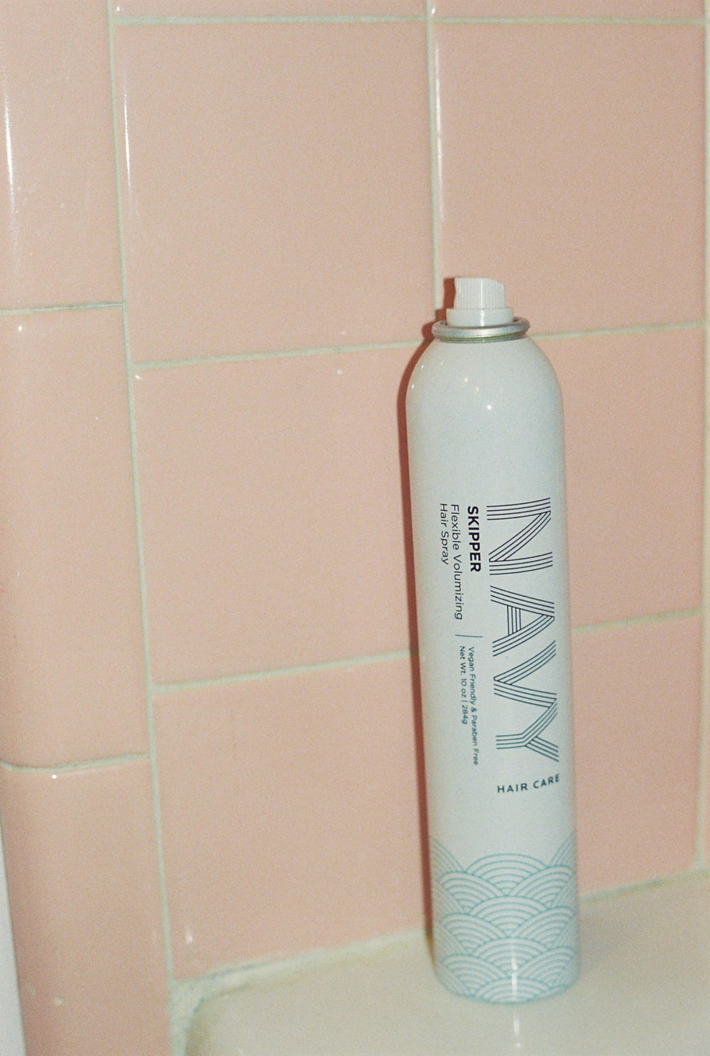 NAVY formula uses sunflower seed extract to nourish strands.