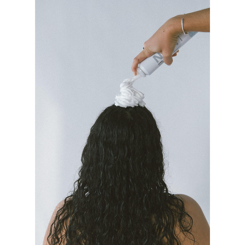 Heat activation with NAVY Surge to maximize root lift using hot tools