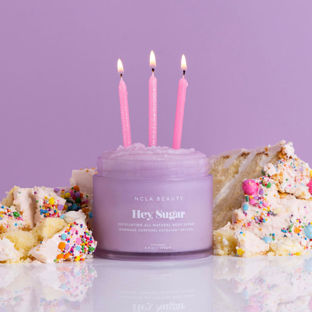 Hey Sugar scrub in shower demonstrates circular application for even exfoliation.