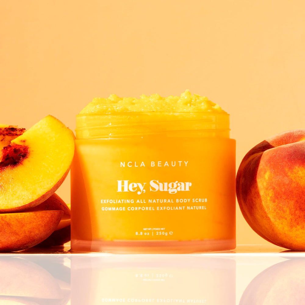 NCLA Beauty Hey Sugar sugar grains close-up highlights gentle exfoliation for smoother skin.