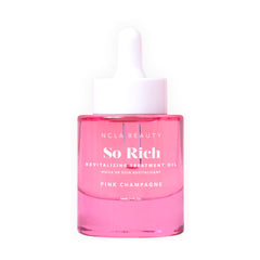 NCLA So Rich Revitalizing Oil bottle being poured with pink champagne scent
