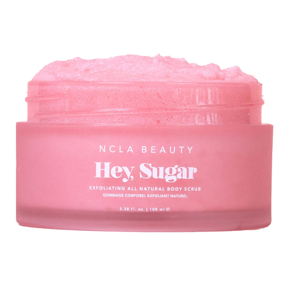 NCLA Beauty Hey Sugar body scrub with pink champagne provides gentle exfoliation and refreshed skin.