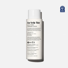 Nécessaire The Conditioner label highlights hyaluronic acid for lasting hydration of hair.