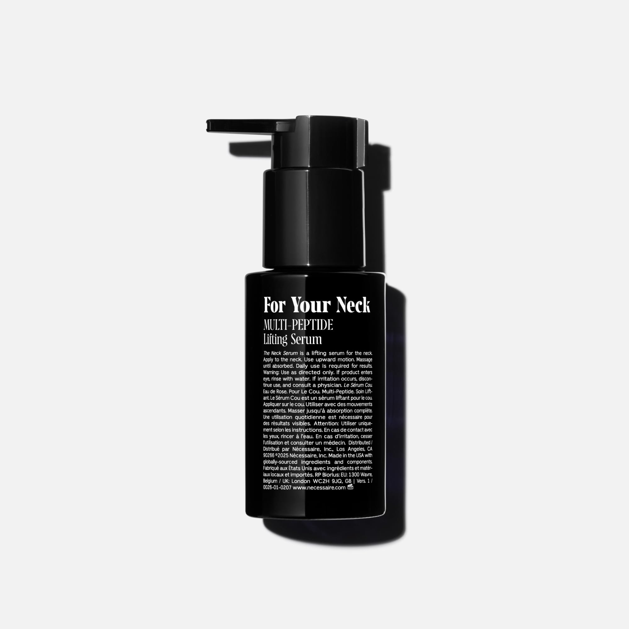 Close-up of Nécessaire neck serum texture ready to absorb.