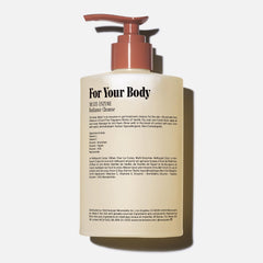 Nécessaire Olibanum body wash foam showing rich lather for a refreshing shower.