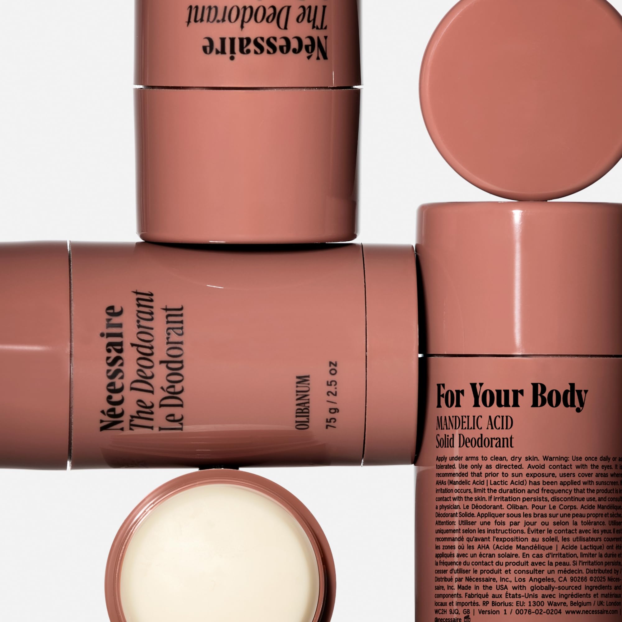 Swipe application of Nécessaire Olibanum deodorant for quick underarm coverage.