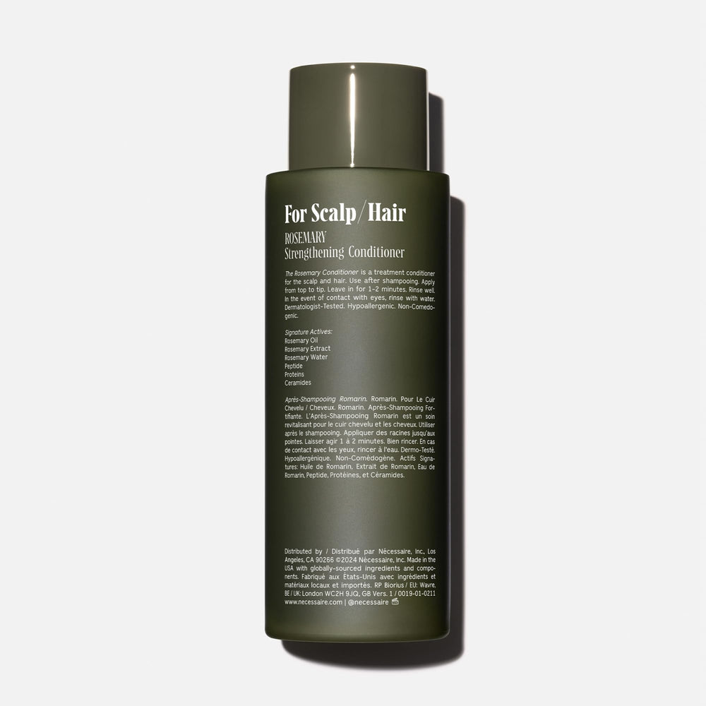 Nécessaire Rosemary Conditioner bottle pour demonstrates even distribution through hair lengths.
