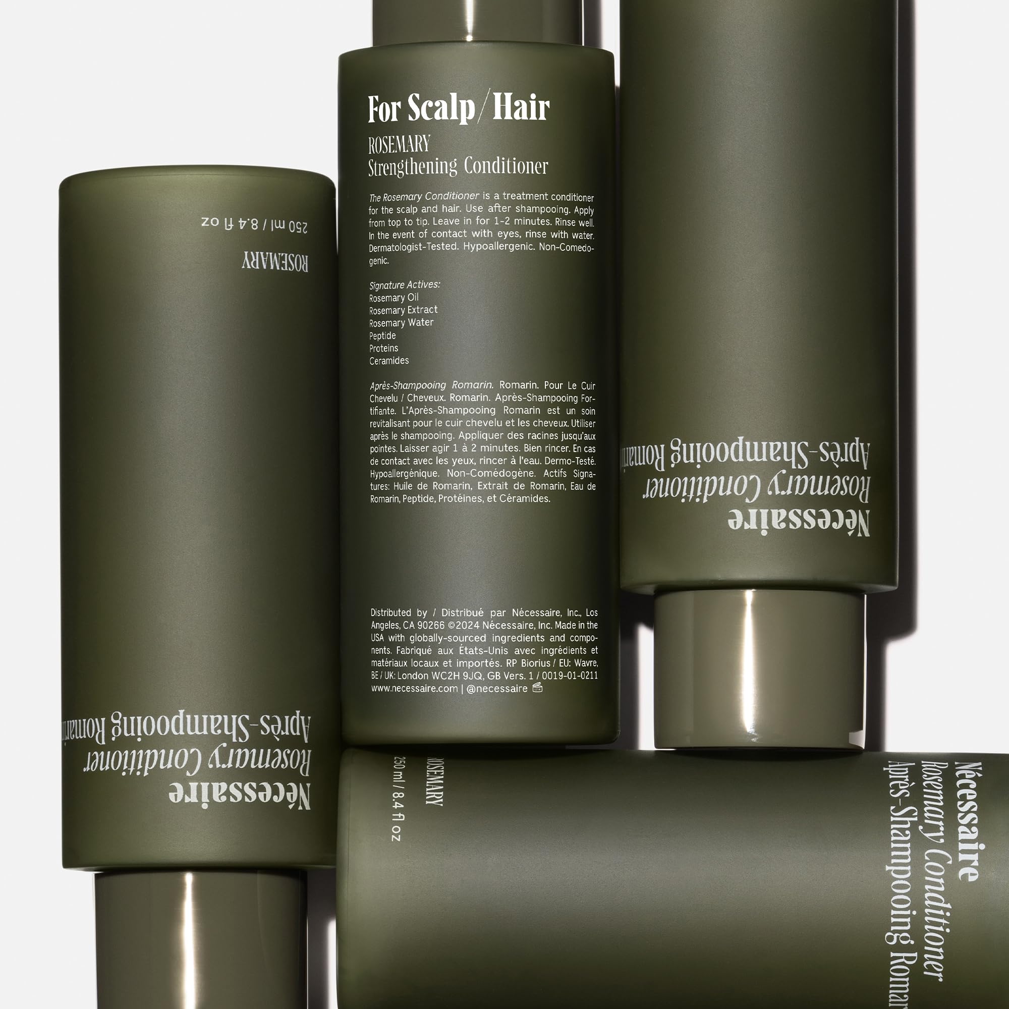 Nécessaire Rosemary Conditioner label closeup emphasizes sulfate-free, color-safe formula.