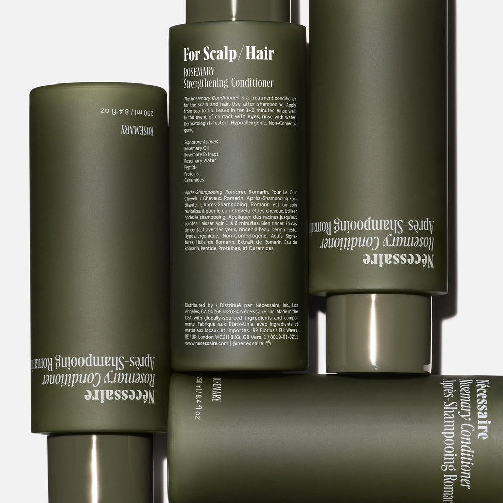 Nécessaire Rosemary Conditioner label closeup emphasizes sulfate-free, color-safe formula.