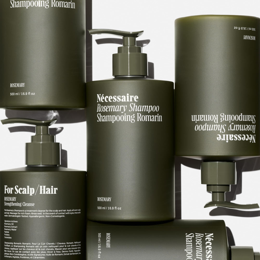 Foamy lather forms from Nécessaire rosemary shampoo during cleansing.