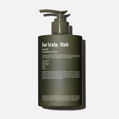 Nécessaire Rosemary Shampoo packaging highlights ceramides and proteins for strengthening.