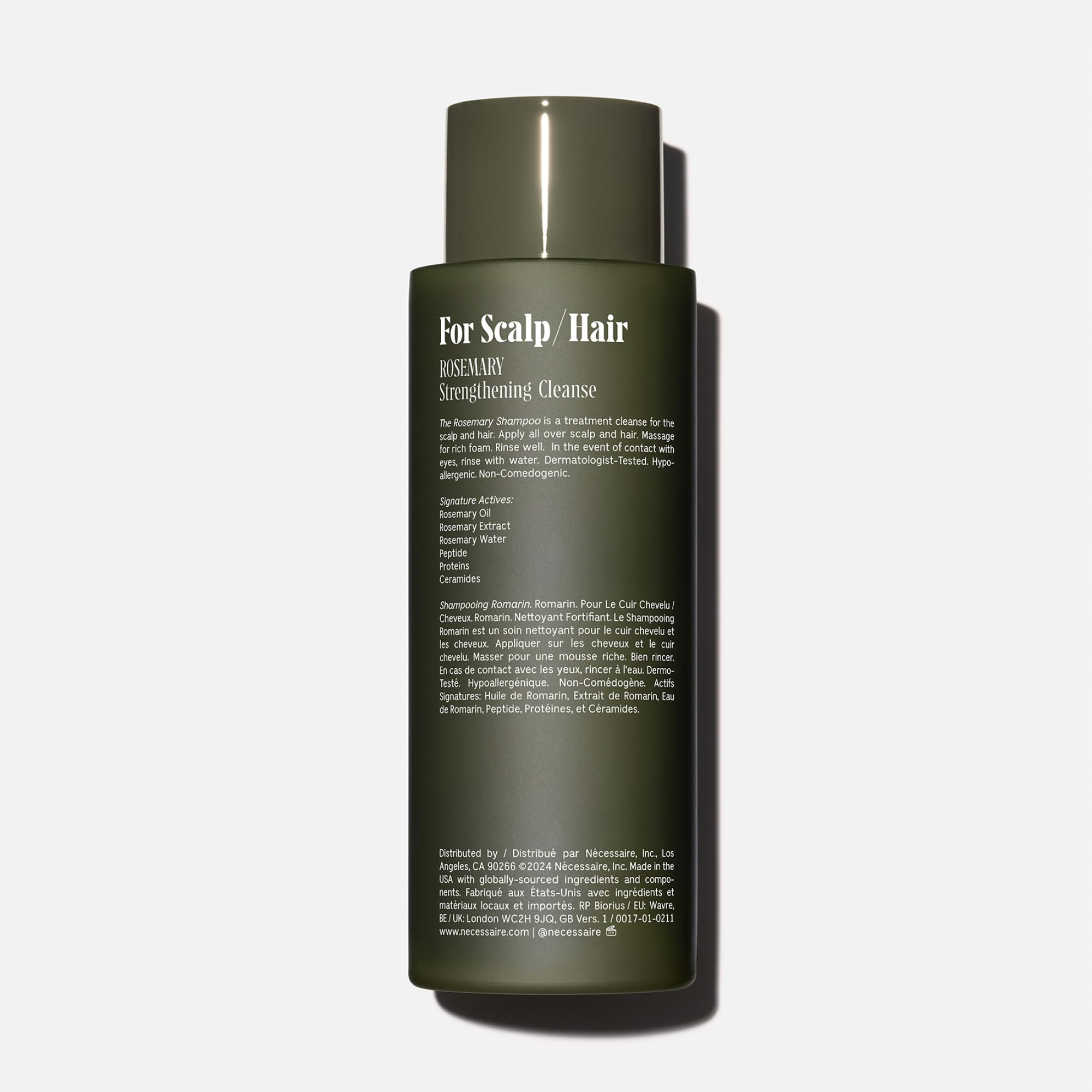 Nécessaire Rosemary Shampoo lather close-up showing gentle cleansing for all hair types.