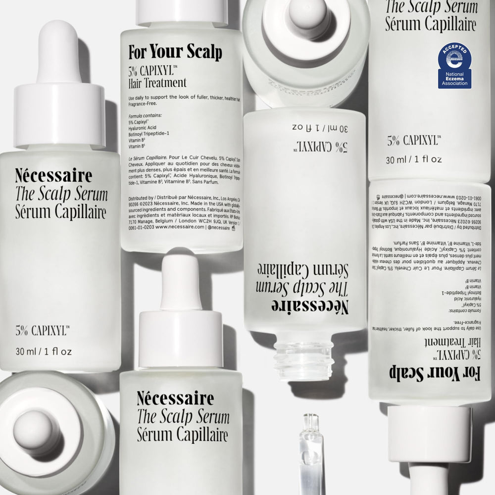 Nécessaire Scalp Serum daily-use concept with light, water-like texture.