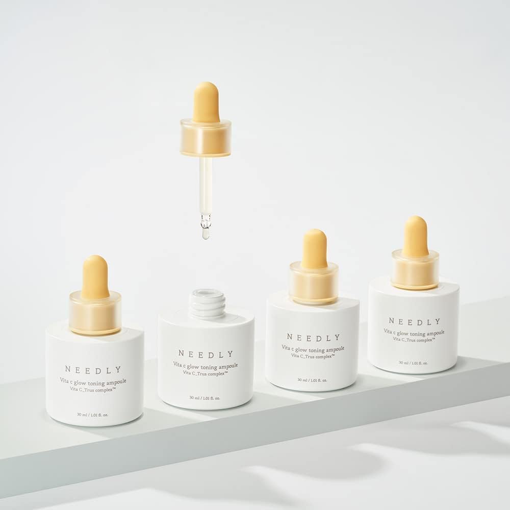 NEEDLY Vita C Glow Toning Ampoule dropper releasing serum