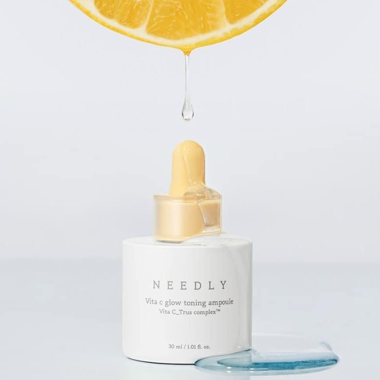Swirl of NEEDLY Vita C Glow Toning Ampoule on skin