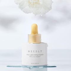 Close-up of NEEDLY Vita C Glow Toning Ampoule texture for hydration