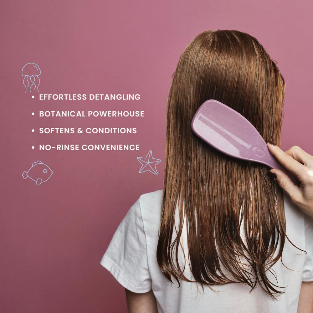 Nemah Kids Leave-In Conditioner spray demonstrates quick mist for knot-free brushing