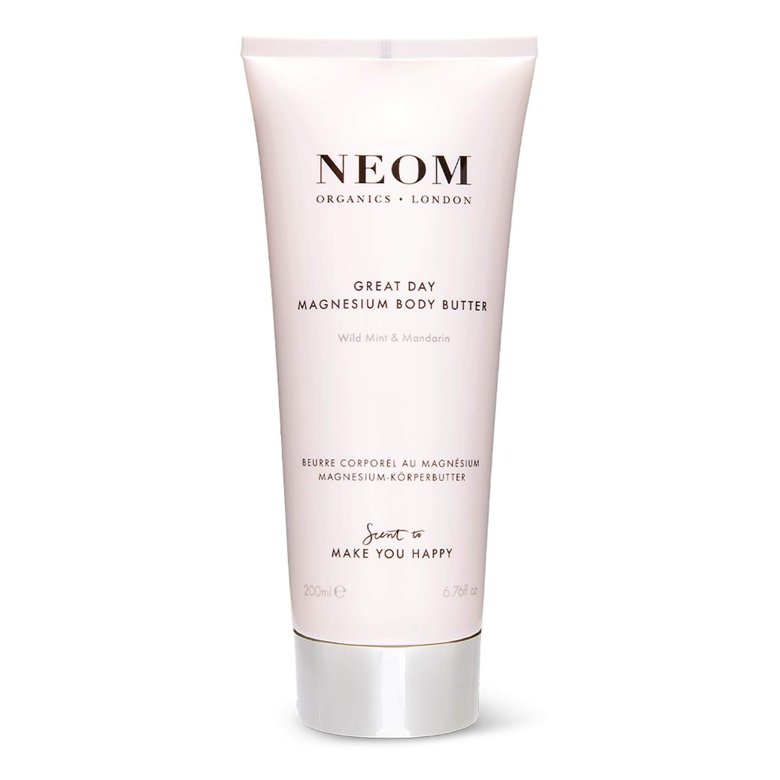 Neom Great Day Magnesium Body Butter bottle glows with uplifting, zesty mandarin and peppermint scent.