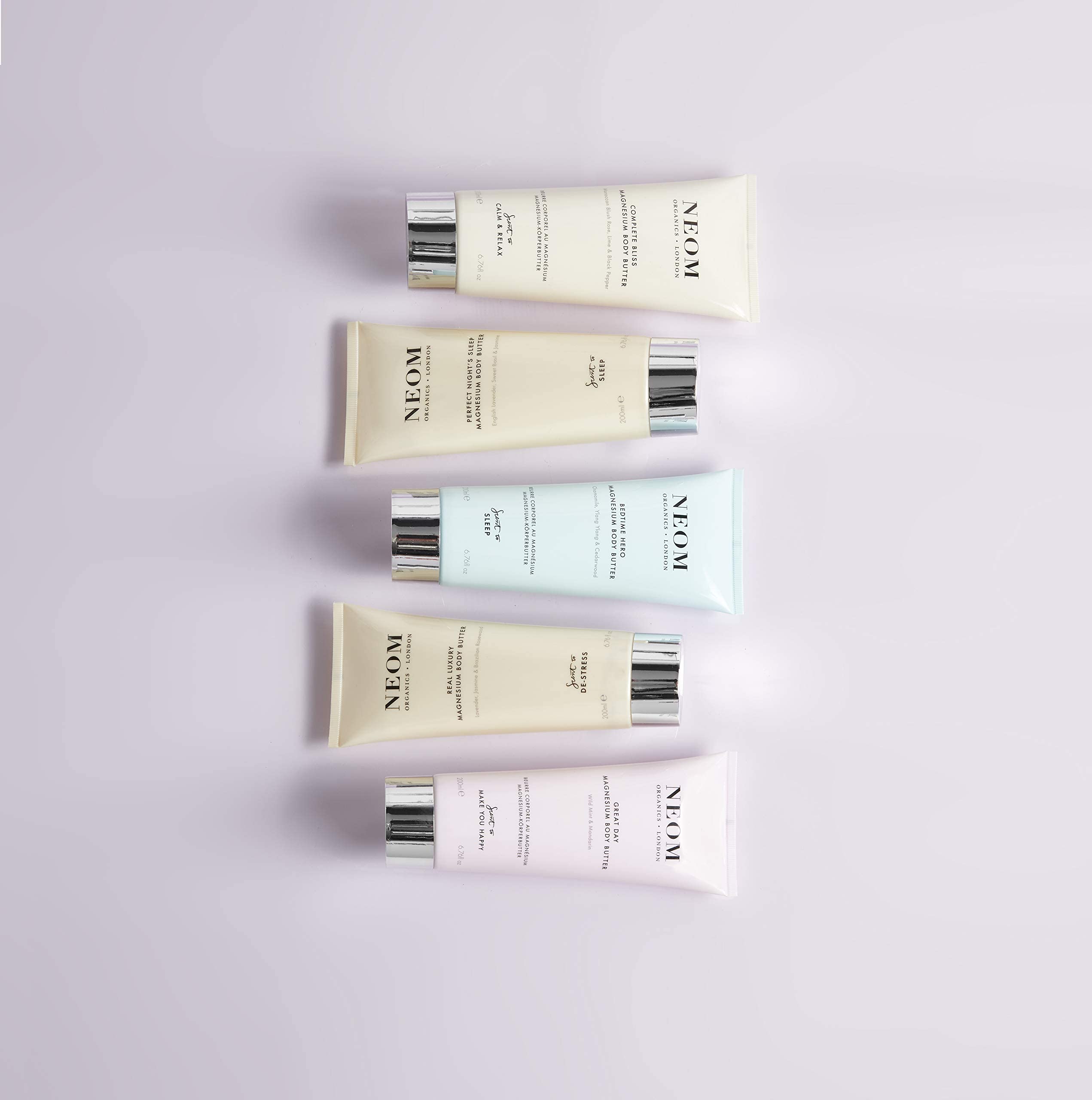 Neom Great Day ingredients list shows shea, aloe, oils.