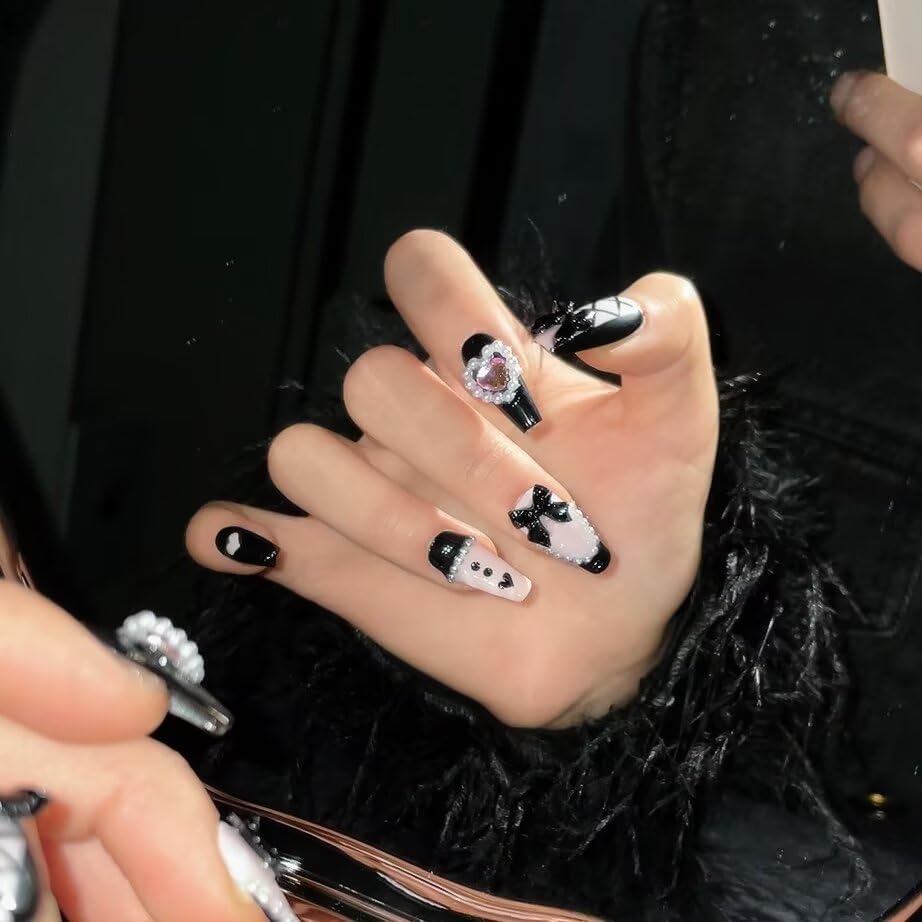 NEUQL artisan bow nail design with hand-painted detailing.