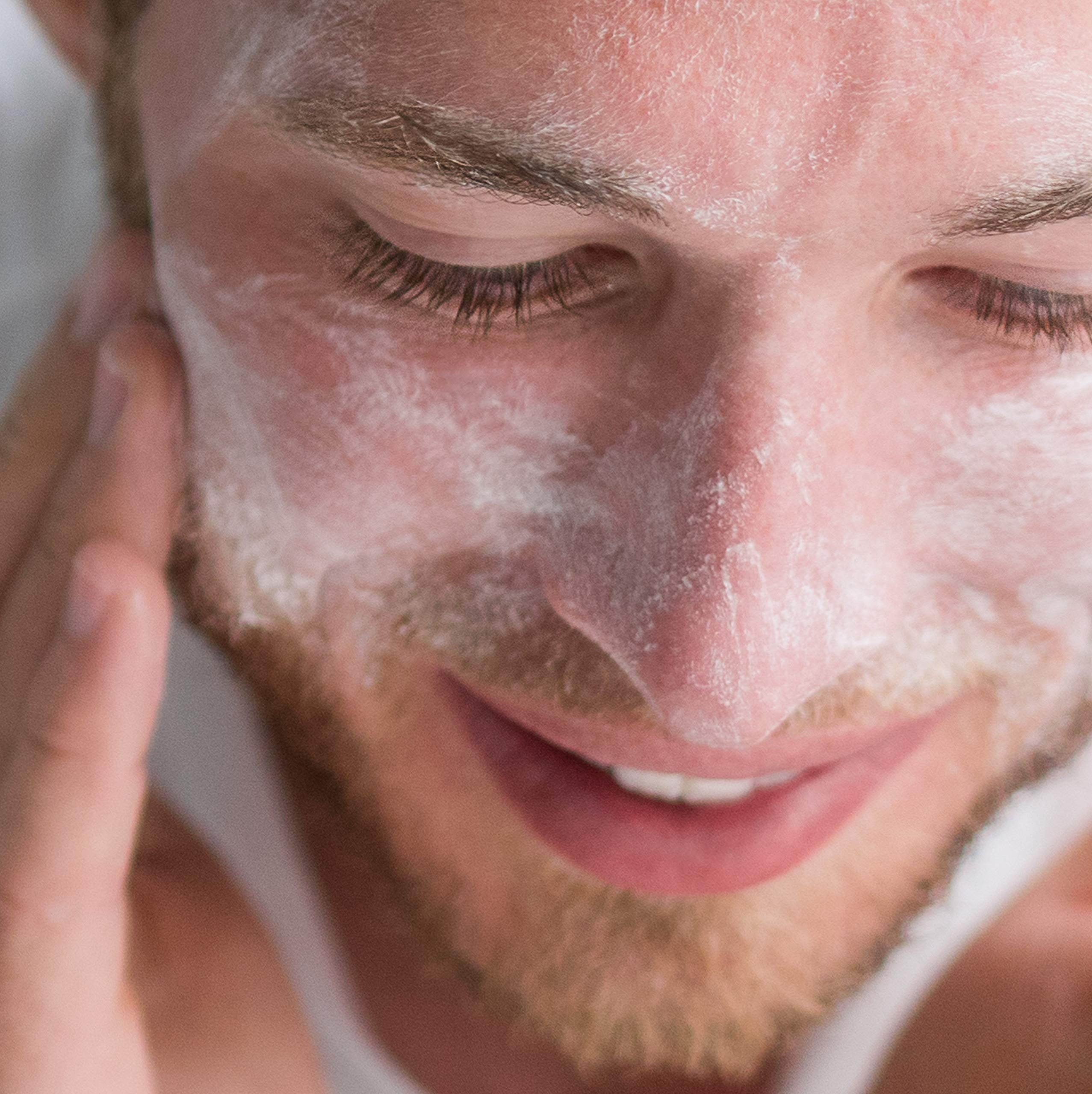 Creamy texture shown for gentle cleansing and exfoliation.
