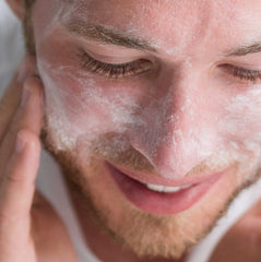 Creamy texture shown for gentle cleansing and exfoliation.