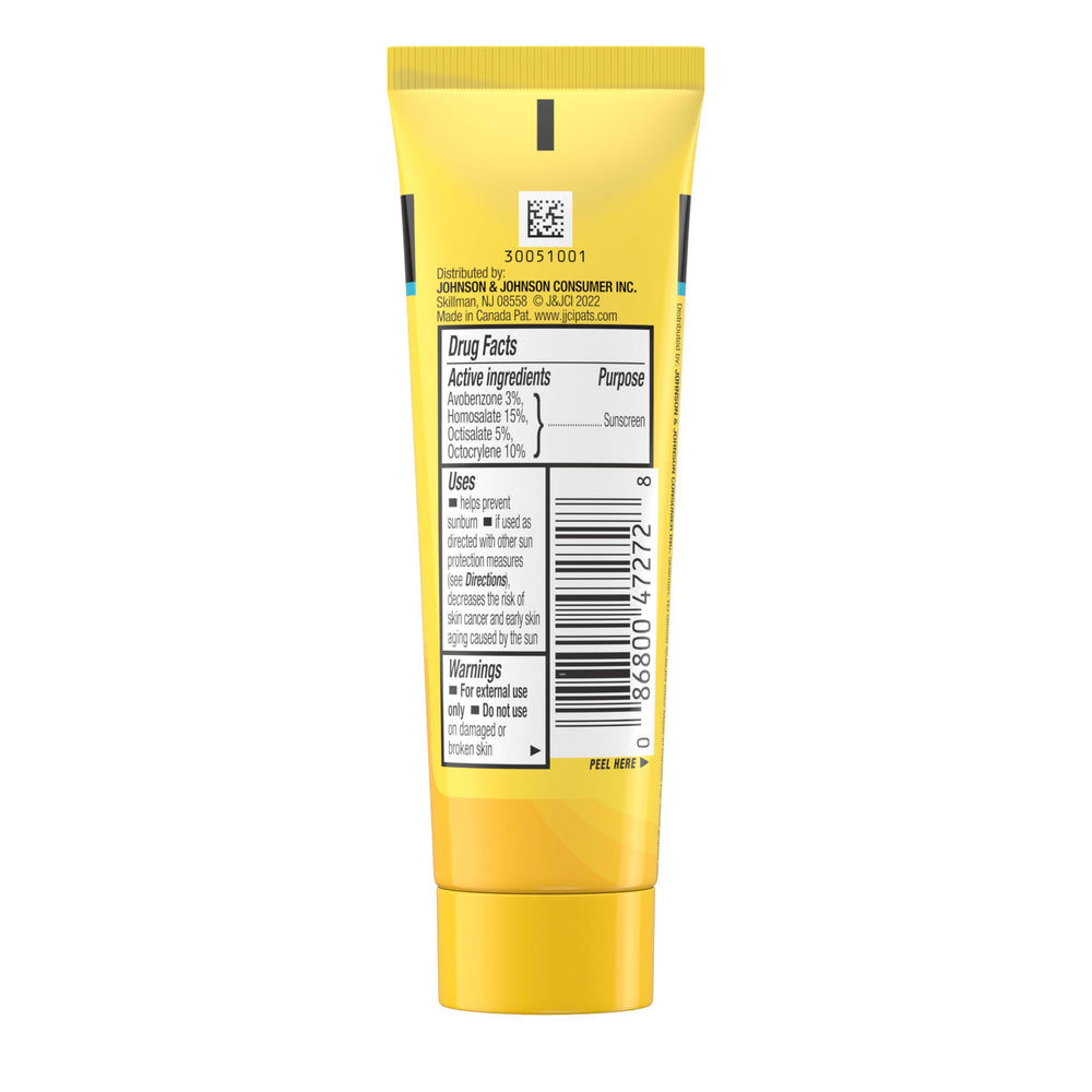 Neutrogena Beach Defense used by family outdoors during beach trips.