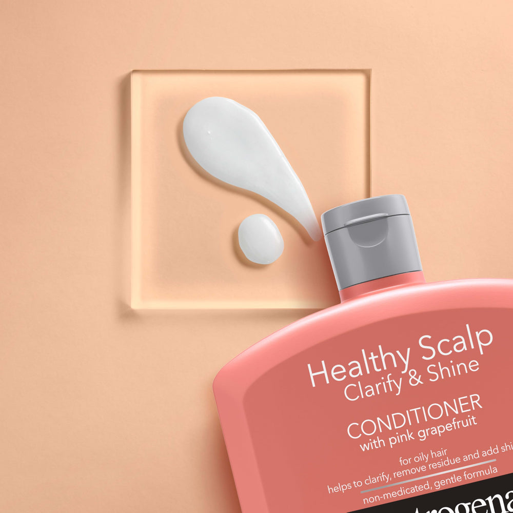 Neutrogena Exfoliating Healthy Scalp Conditioner front packaging conveys color-safe formula for vibrant hair