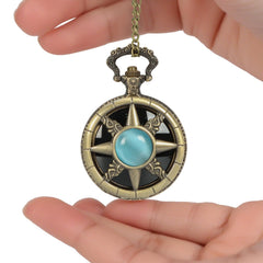 NewRiu scrying mirror case detail showing vintage compact shell for portable rituals.