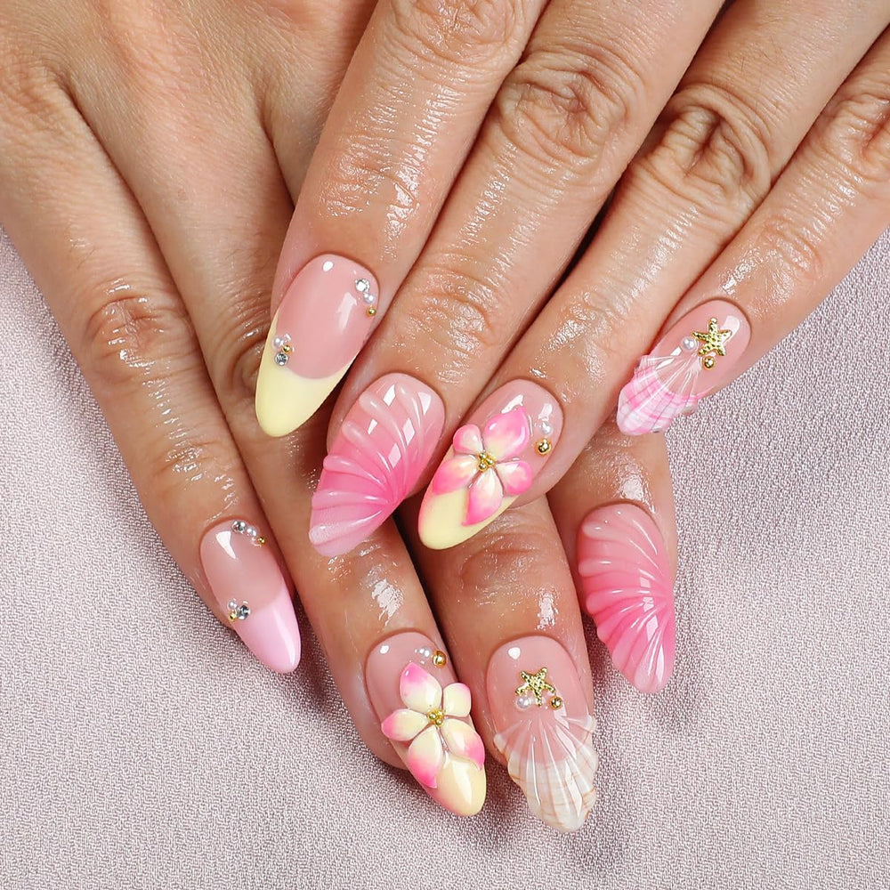 NEWSPIED gold shell and starfish design nails with beach sparkle