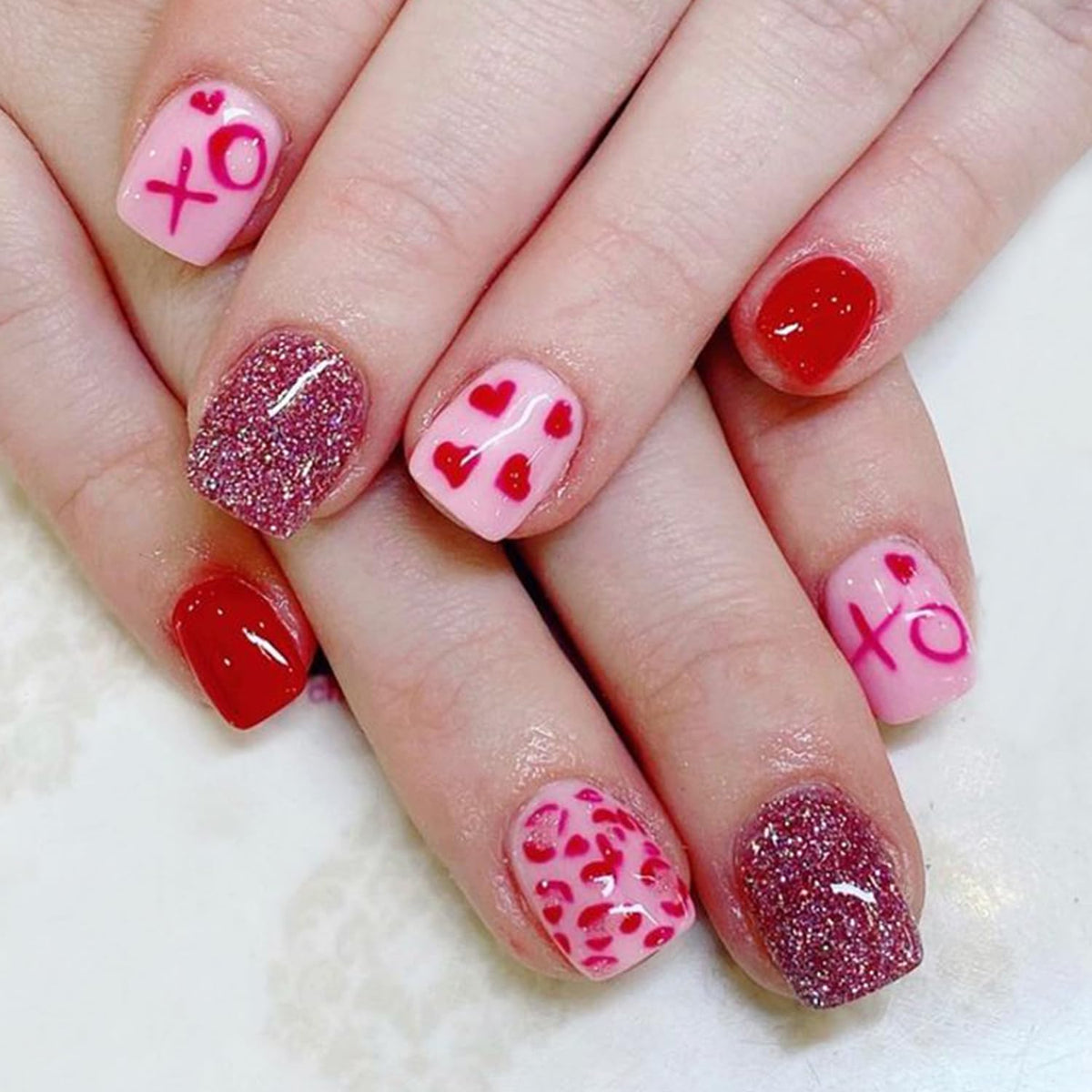 NEWSPIED valentines nails with red heart design for stylish, party-ready manicure.
