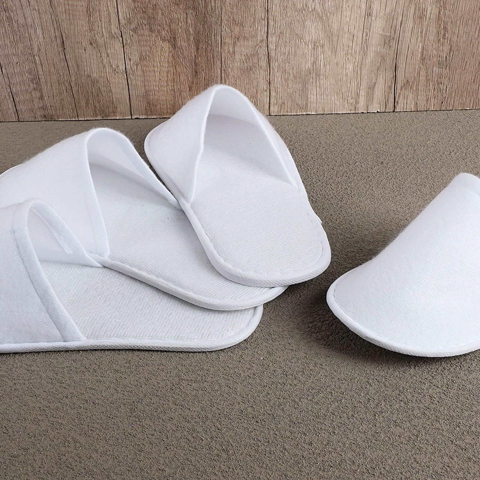 Nexboraque slippers on foot demonstrating universal fit for guests