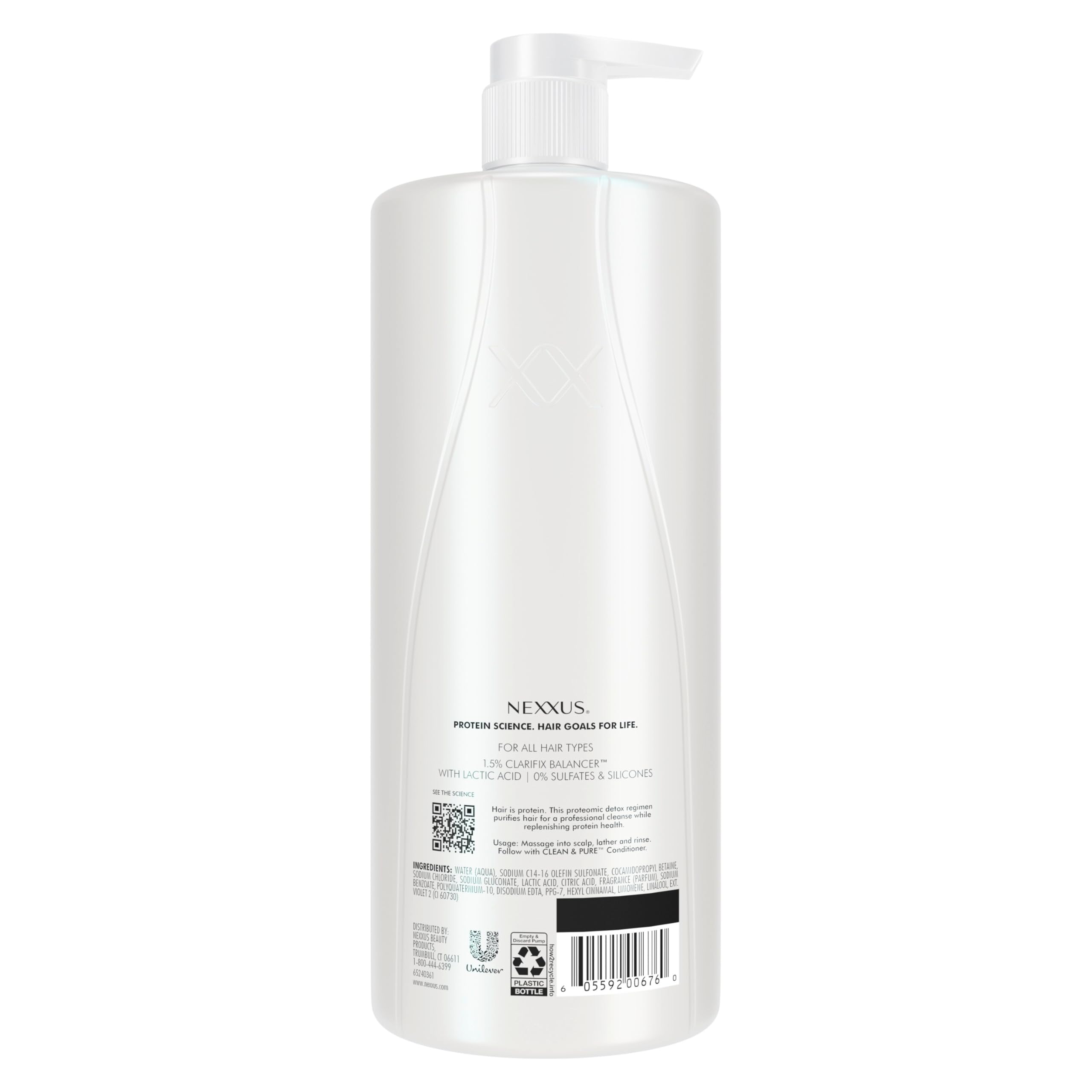 Nexxus Clean & Pure clarifying shampoo label close-up emphasizes silicone-, dye-, and paraben-free formula