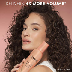 Nexxus Volume Mousse on hair for lifted volume and color-safe care.