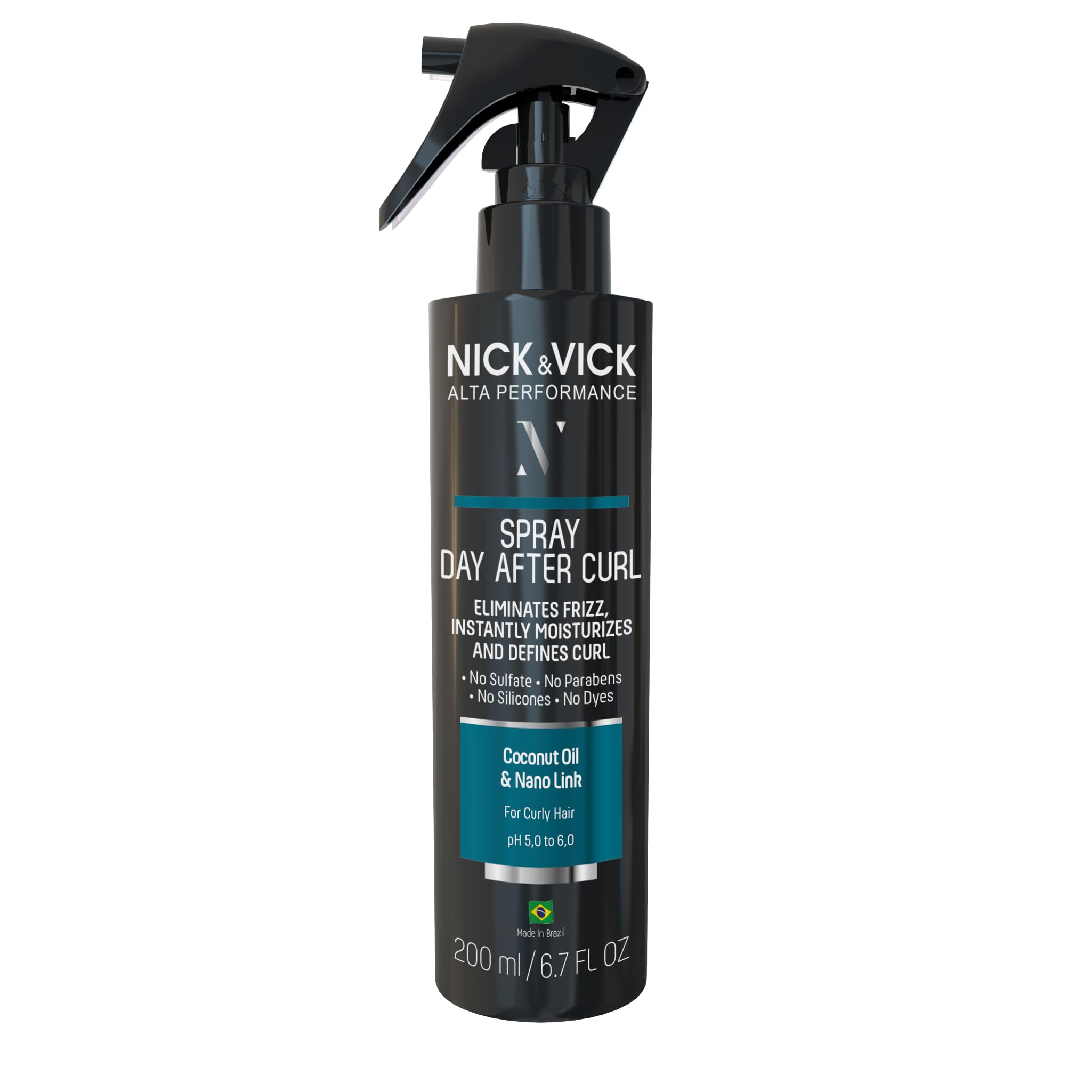 Nick Vick Day After Curl Definer bottle pour guides even application for defined curls.