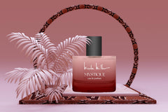 Nicole Miller Mystique bottle close-up highlighting warm sugar and musk tones.