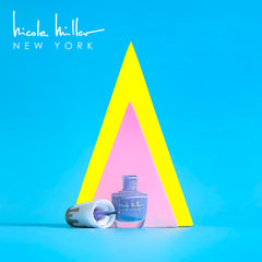 Nicole Miller New York top coat bottle delivering a glossy, durable finish