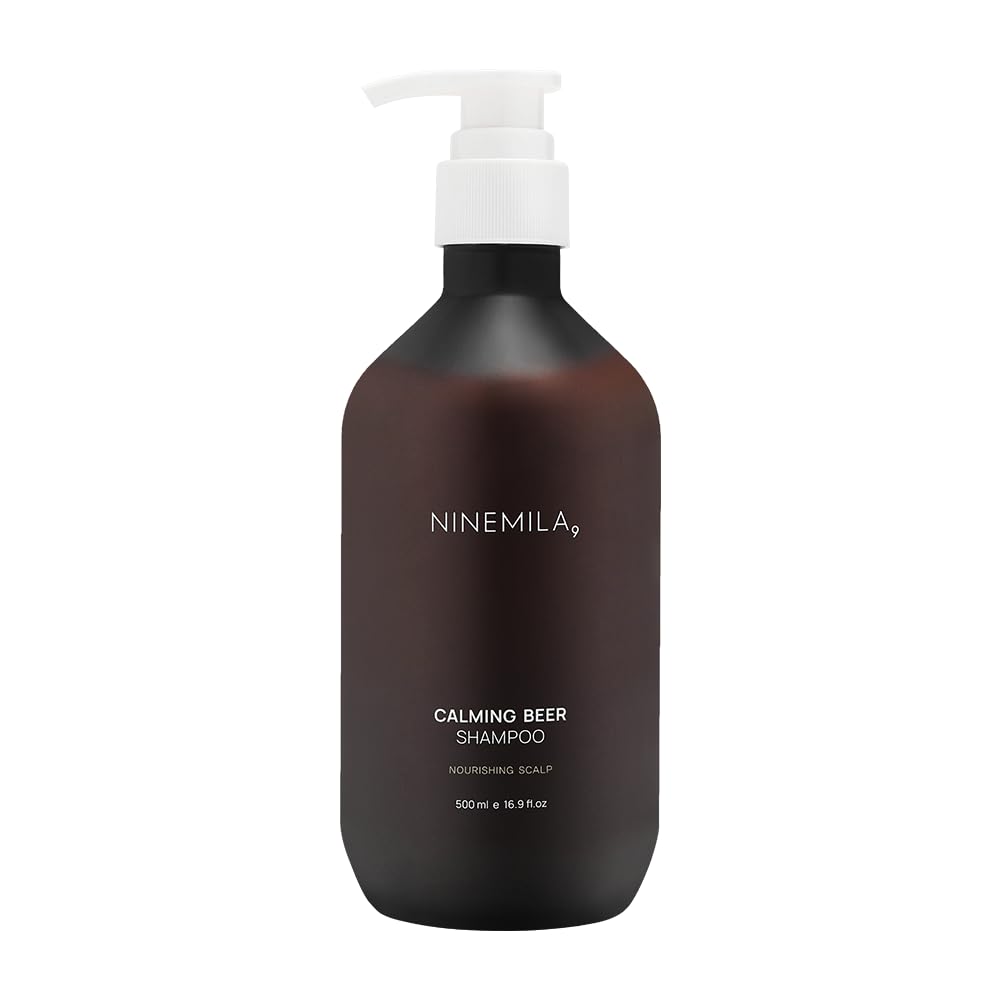 NINEMILA9 Calming Beer Shampoo bottle front highlights a soothing, postpartum-friendly formula.