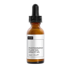 NIOD Photography Fluid Tan Opacity bottle highlights even skin tone and hydration