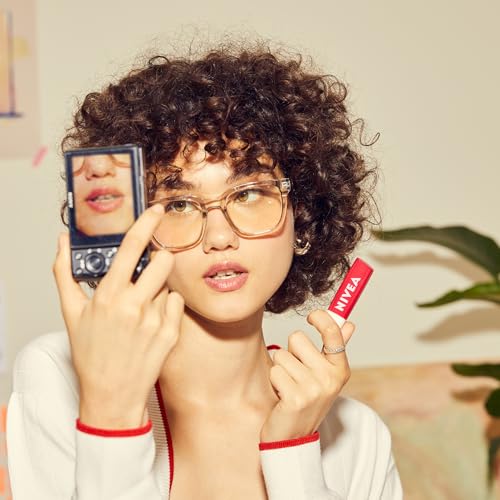 NIVEA Cherry Lip Care applied daily for lips with moisture.
