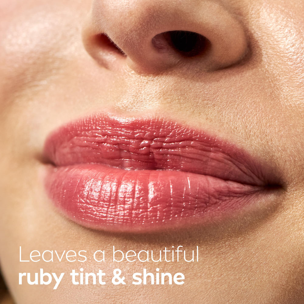 NIVEA Cherry Lip Care swatch shows ruby tint and subtle shine.