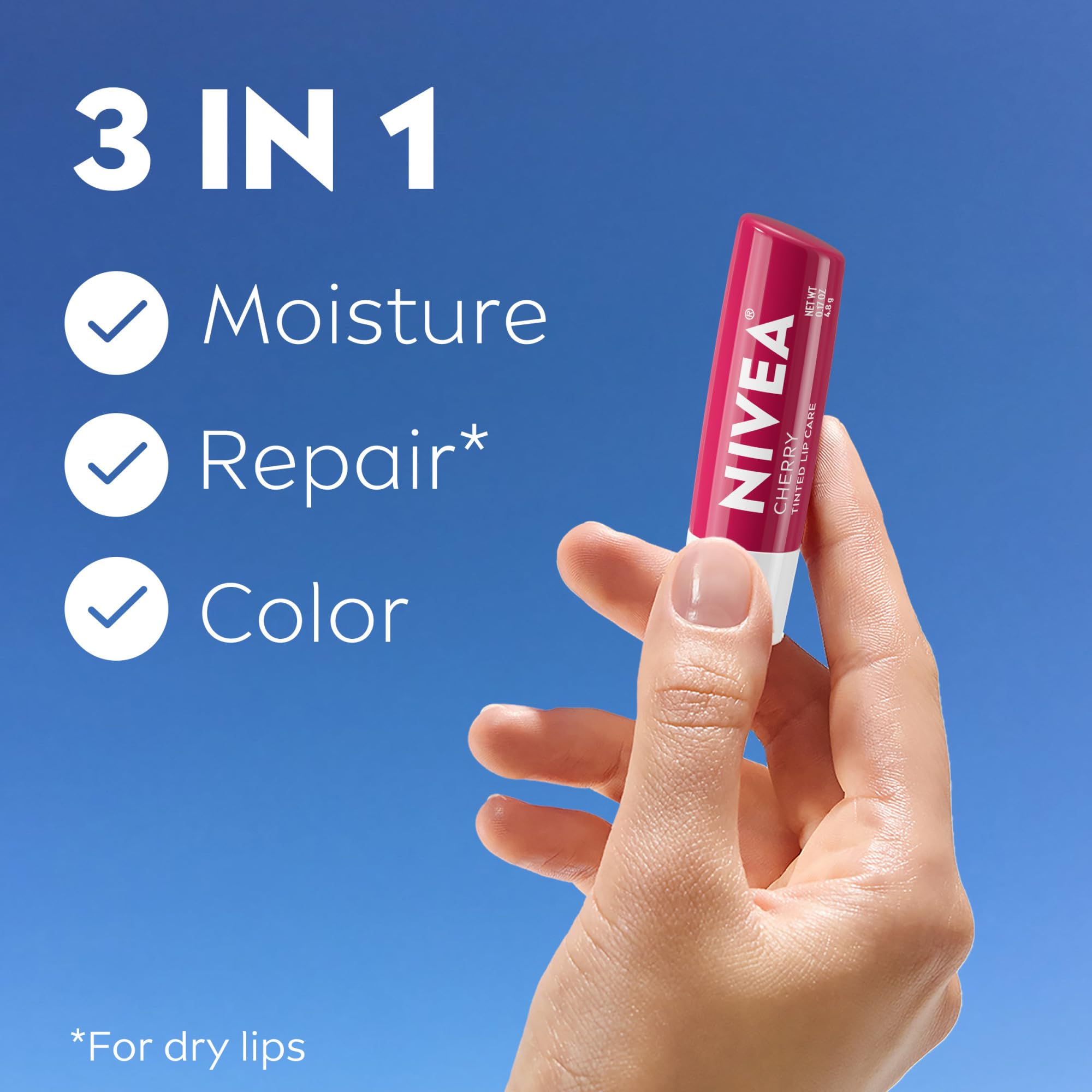NIVEA Cherry Lip Care tube on desk for on-the-go moisture.