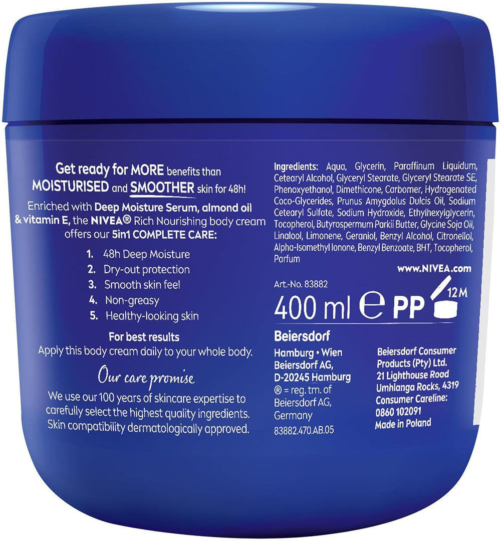 NIVEA cream in hand applying to arm to show quick absorption