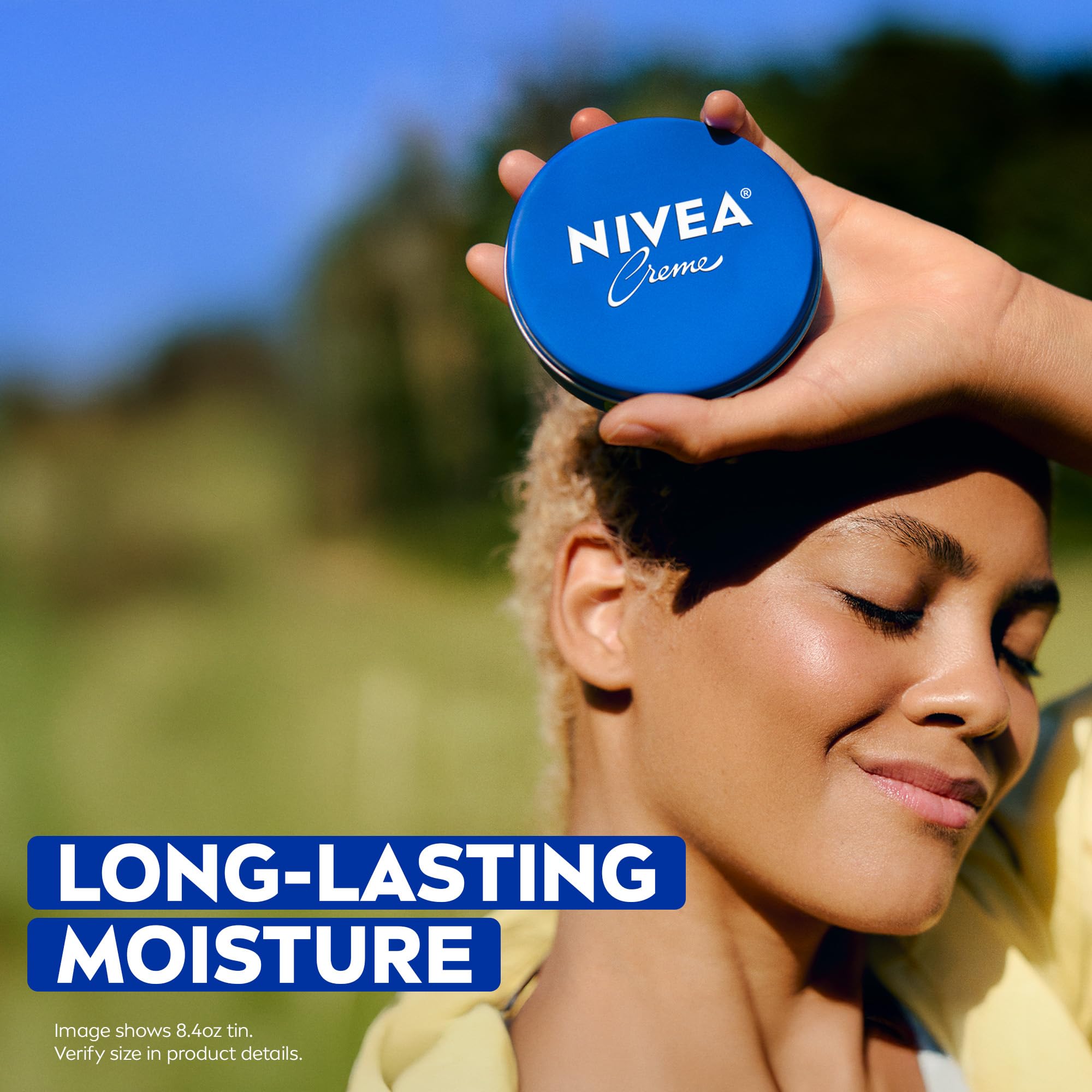 Hands applying NIVEA Creme for daily moisturization and smooth skin.